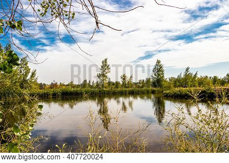 Peaceful Pond In Centre Of Town. Coledale, Alberta, Canada
