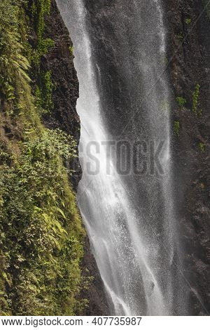 Close-up View Of The Fresh, Noisy And Intense Water In Tumpak Sewu Waterfall, In East Java, Indonesi