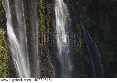 Close-up View Of The Fresh, Noisy And Intense Water In Tumpak Sewu Waterfall, In East Java, Indonesi