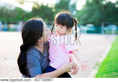 Mother Lovingly Hugged Her Daughter. Daughter Listened Carefully To The Words Her Mom Taught. On Win