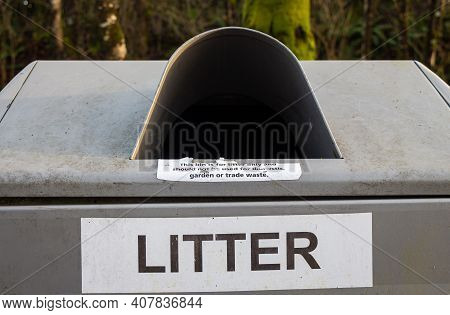 Litter Sign On A Silver Steel Trash Can Or Bin In The Countryside Park
