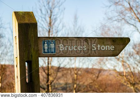 Sign To Bruce's Stone At Clatteringshaws Loch, Galloway Forest Park, Scotland