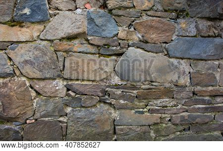 Castle Wall Made Of Old Stones. Castle Wall Made Of Old Stones Textures For Design And Photo Backgro