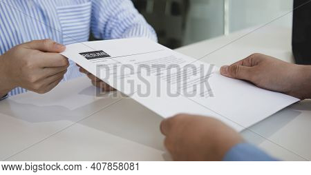 Applicants submitting a resume to the staff to apply for a job, Participating in the selection of ap
