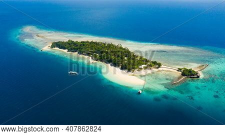 Little Liguid Island With A Sandy Beach And Azure Water Surrounded By A Coral Reef And An Atoll, Aer