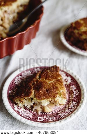 Apple And Cheese Cobbler Crisp. Cobbler Or Crumble Dessert With Apples In Ceramic Baking Form On Bei