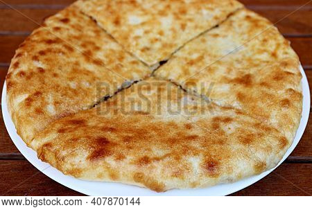 Plate Of Kubdari, The North-western Georgian Traditional Flat Bread Stuffed With Spiced Pork Or Beef