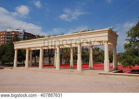 VALENCIA, SPAIN - SEPTEMBER 5, 2019: Decorative colonnades in the Turia river park. The 9km long park was created after diverting the Turia river to prevent flooding.