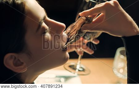 Syster Shell In Mouth. Beautiful Woman In Expensive Restaurant Eat Oyster And Lick On Cafe Backgroun
