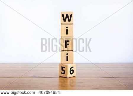 Wifi 5 Or 6 Symbol. Turned A Wooden Cube And Changed The Words Wifi 5 To Wifi 6. Beautiful Wooden Ta
