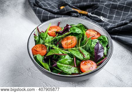 Healthy Salad With Mix Leaves Mangold, Swiss Chard, Spinach And Arugula In A Salad Bowl. White Backg