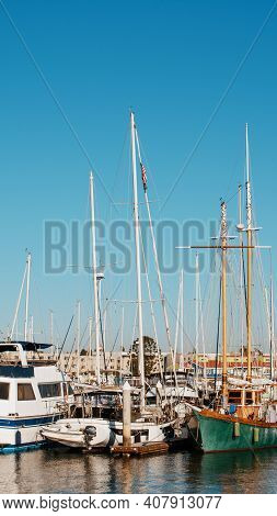 Fishing Boats Parked At Harbour.  Many Nautical Vessels In Still Waters