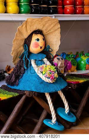 Raquira, Colombia - February 2021. Beautiful Handmade Yute Dolls In The Small Town Of Raquira.the Ci