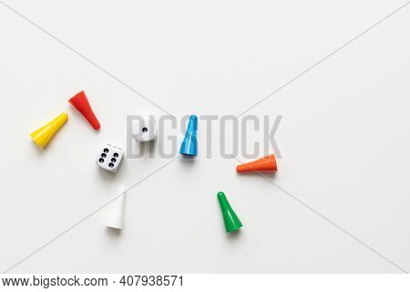 Game Cubes, Chips, Hourglass On A White Background. The Concept Of Home Board Games, Classes At Home