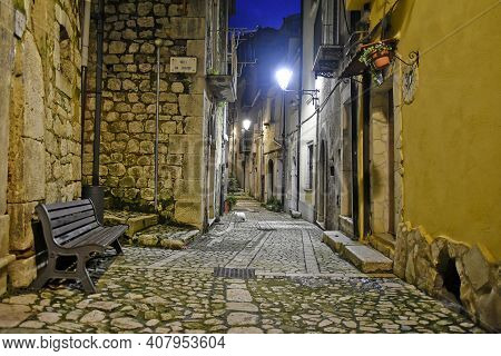 A Narrow Street Between The Old Houses Of Guardia Sanframondi, A Village In The Province Of Benevent