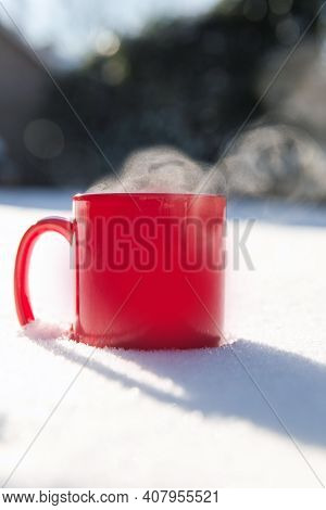 Steaming Cup Of Hot Coffee,tea Or Chocolatemilk In The Cold Fresh White Snow, Winter,cozy,drink,snow