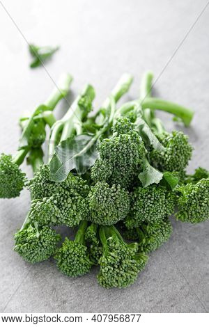 Broccolini. Fresh Bunch Of Broccoli Sprouts On A Cooking Table. Healthy Food Concept