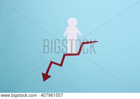 Paper Man Descends Along A Red Curved Arrow Tending Downward. Blue Background. Symbol Of Financial A