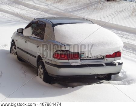 Kazakhstan, Ust-kamenogorsk, February 20, 2020: Mazda Capella Sixth-generation (gf, Gw; 1997-2002). 