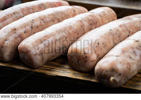 Traditional Chicken Mest Sausages, On Black Background.