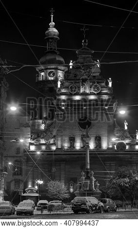 Grayscale. Night Winter Lviv City (ukraine) Cityscape. Bernardine Church And Monastery (church Of St