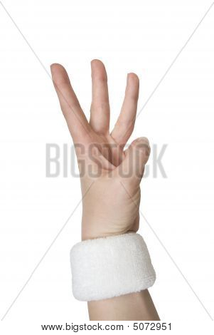 Frau Hand in Wristlet zeigt drei