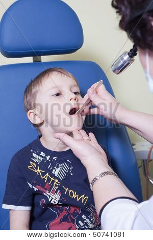 Medical Otitus Examination Of A Child At A Ear Nose Throat Doctor
