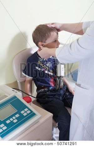 Medical Otitus Examination Of A Child At A Ear Nose Throat Doctor