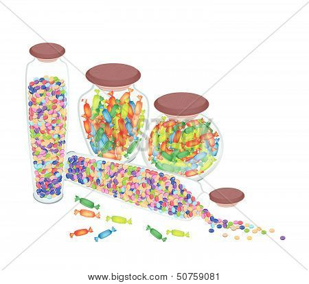 Four Bottles Of Chocolate Candies And Hard Candies