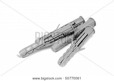 Three Plastic Straddling Dowel On White Background