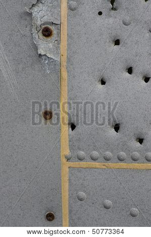 Damaged Metallic Background Texture With Holes