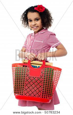 Pretty Child Carrying Math Equipment's In Basket