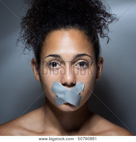 Black Woman With Mouth Covered With Tape