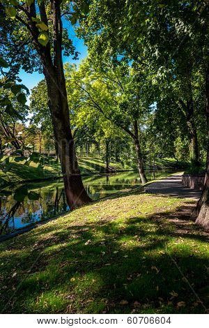 Riga Canal In Summertime That Flows Through The Bastion Park (bastejkalns). Latvia
