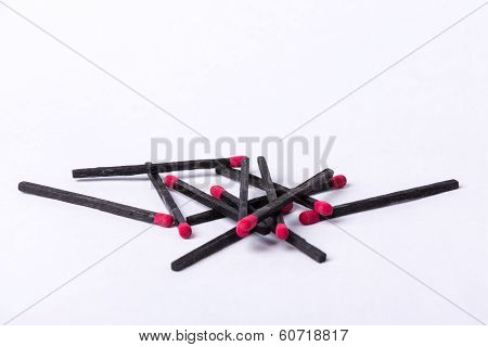 Black matches on white background