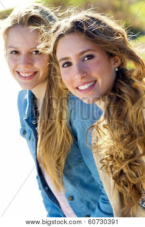 Beautiful Young Girls Looking At The Camera