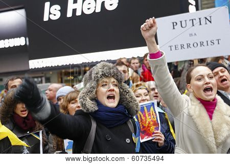 Young women with outraised fists
