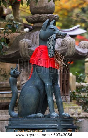 Kitsune sculpture at Fushimi Inari-taisha shrine in Kyoto