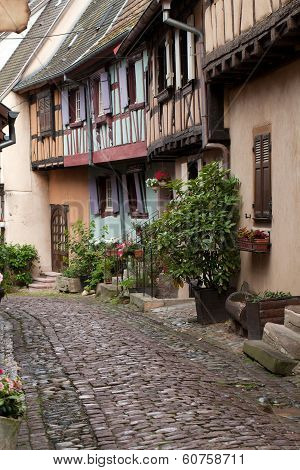 Street with half-timbered medieval houses in Eguisheim