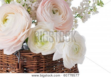 Buttercups And White Lilac In A Wicker Basket