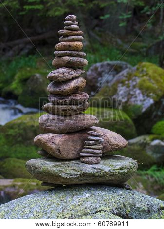 Pebbles, stacked stones as a stone statue, short depth of field