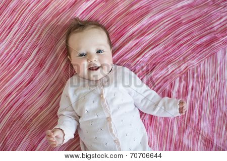 Baby On Pink Sheet