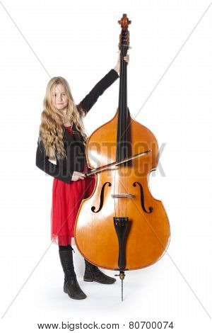 Young Girl Plays Double Bass In Studio