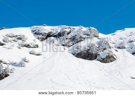 Ski snowboard and avalanches tracks.