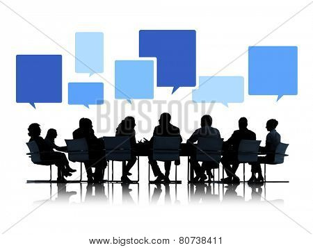 Sihouettes of Business People in a Meeting with Speech Bubbles