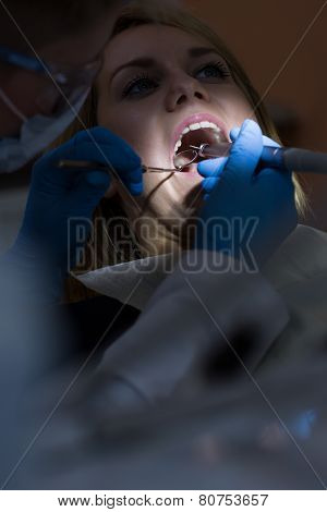Stomatologist Doing Dental Treatment
