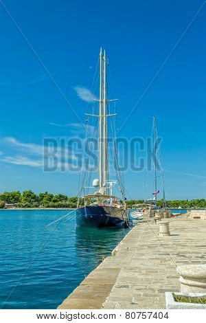 Moored yachts in Supetar