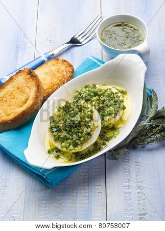 marinated tomino cheese with herbs