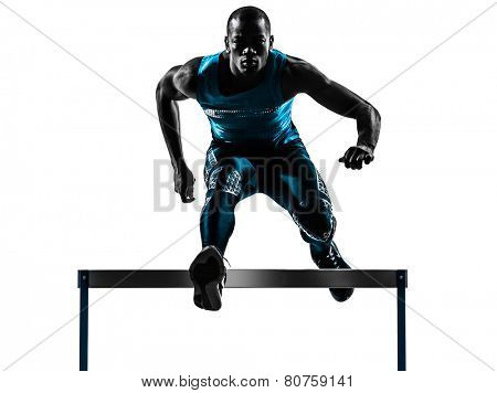 one african man hurdler running in silhouette studio isolated on white background