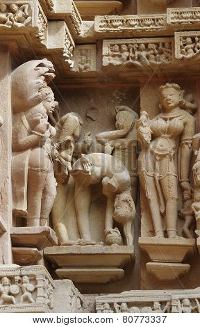Stone carved erotic bas relief in Hindu temple in Khajuraho